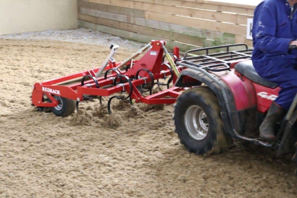 Redback Arena Groomer_turning behind ATV